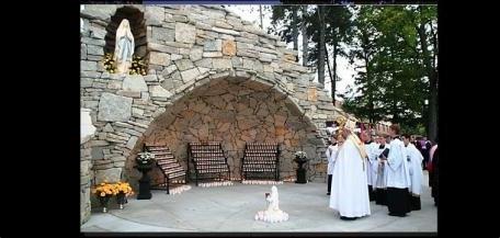 Abbot James leads procession to Mary's grotto